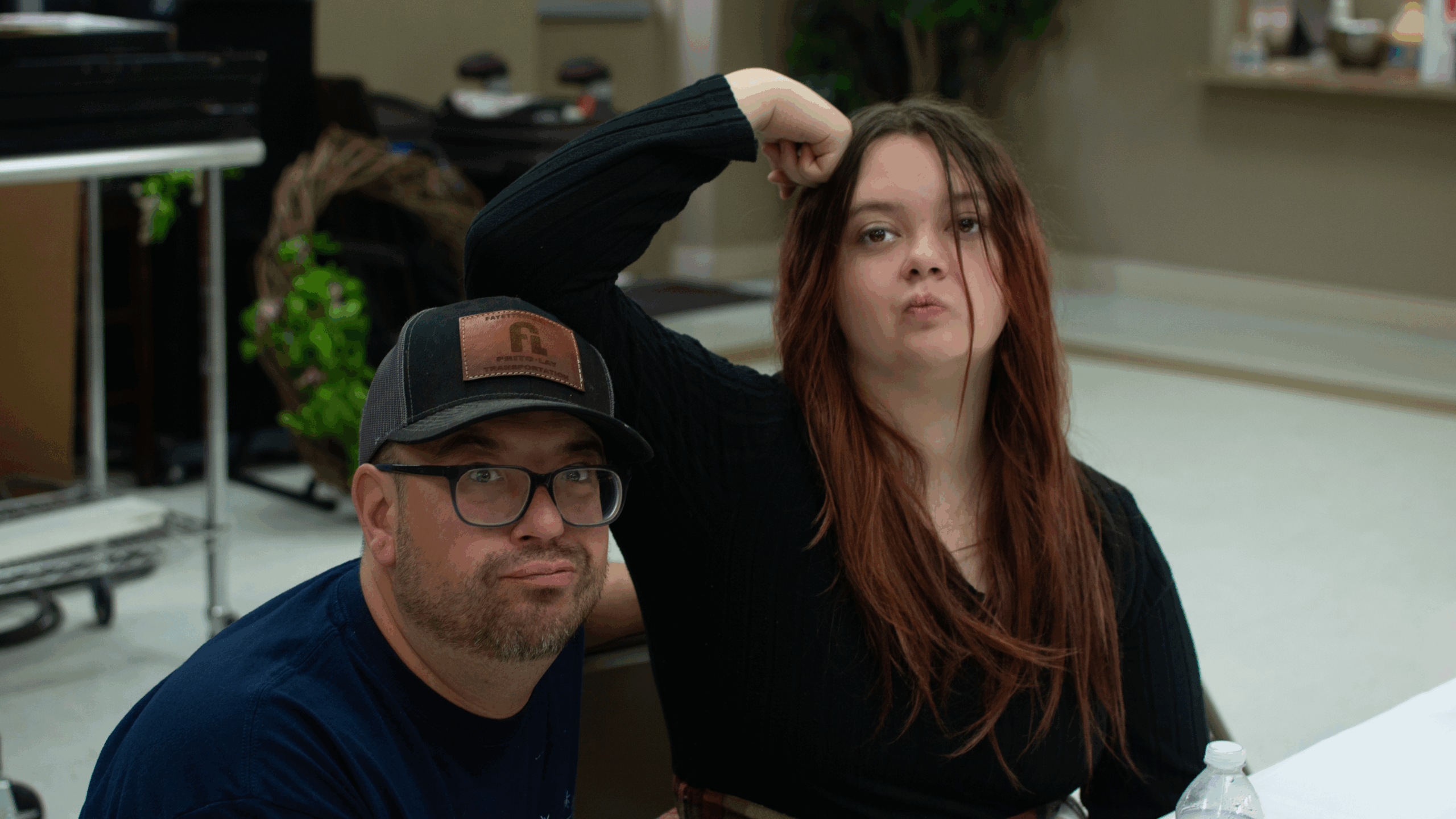 12 woman beside white vehicle during daytime