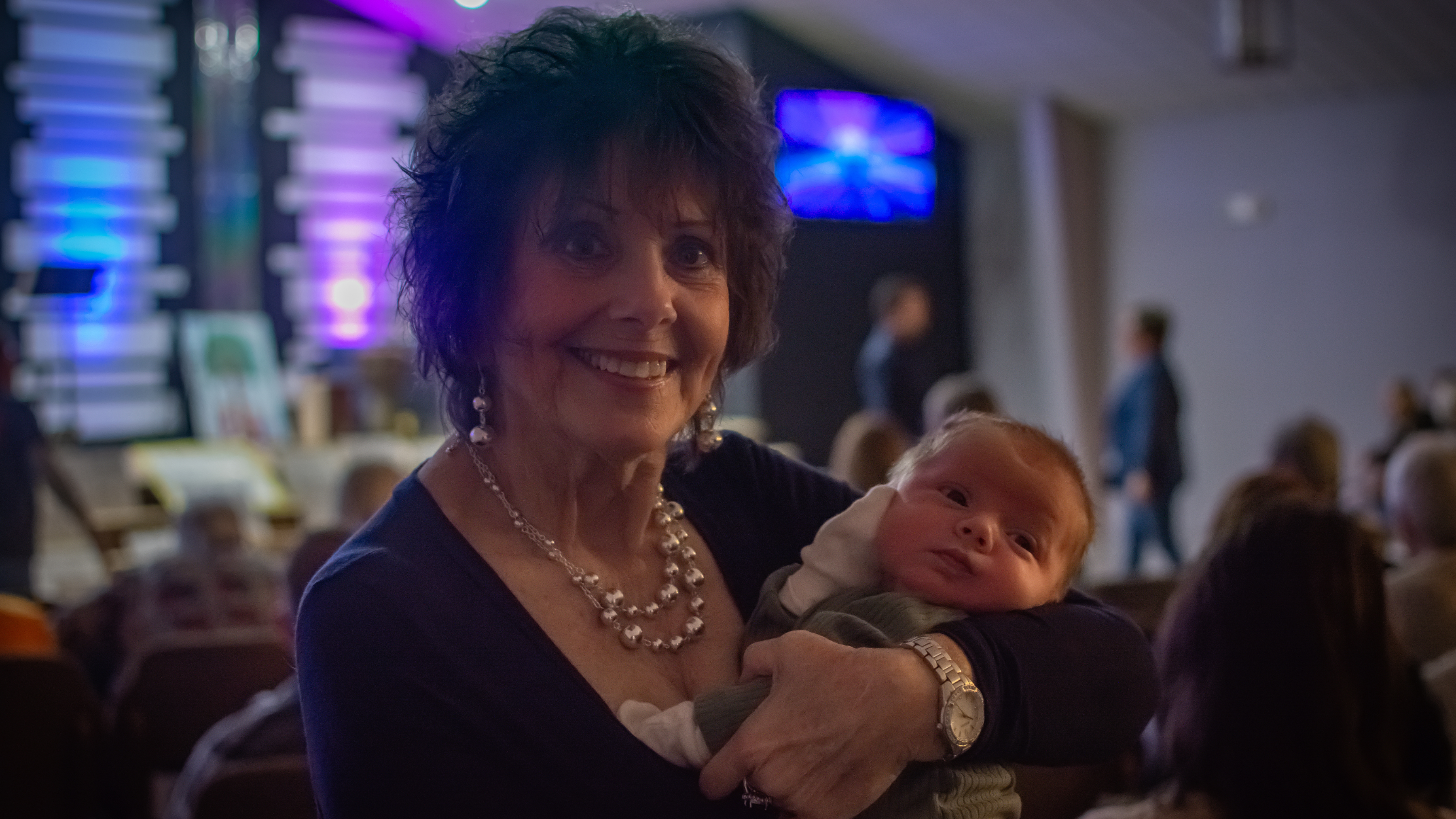 18 three men and laughing two women walking side by side