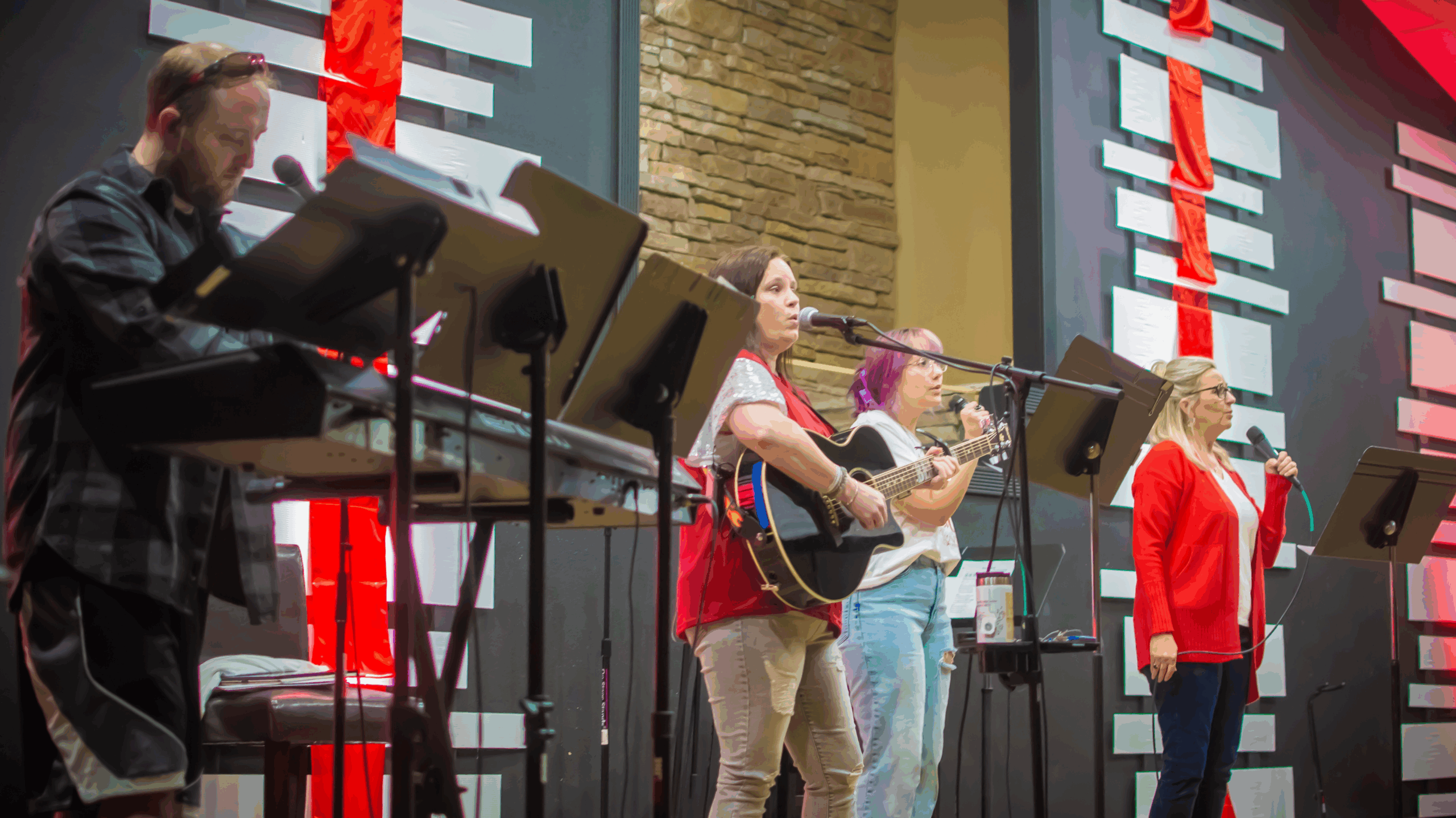 30 three men and laughing two women walking side by side