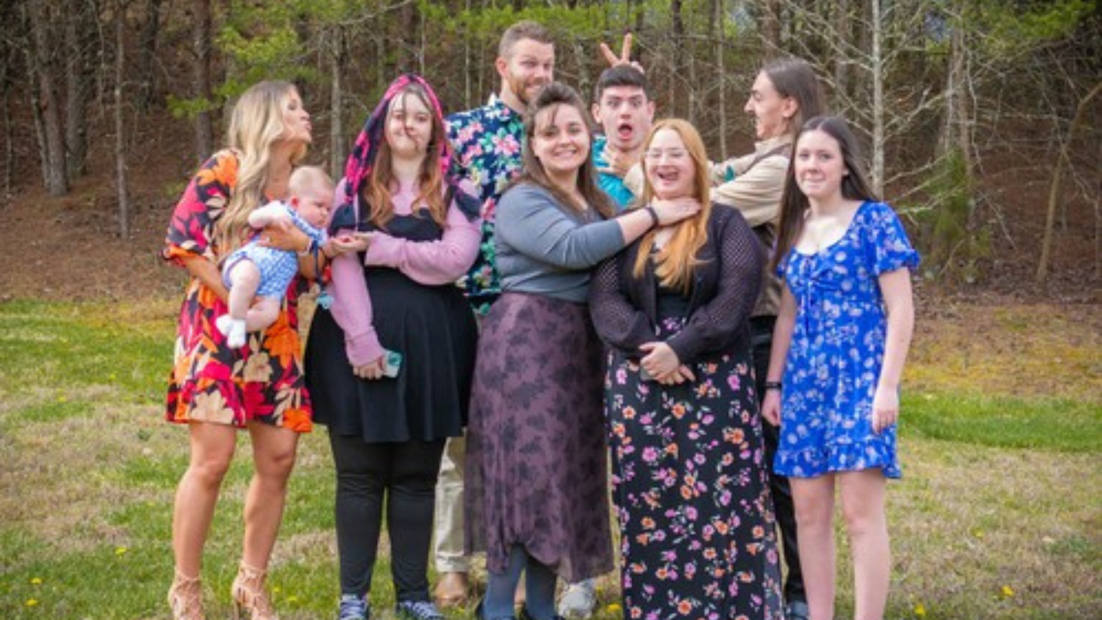 34 three men and laughing two women walking side by side