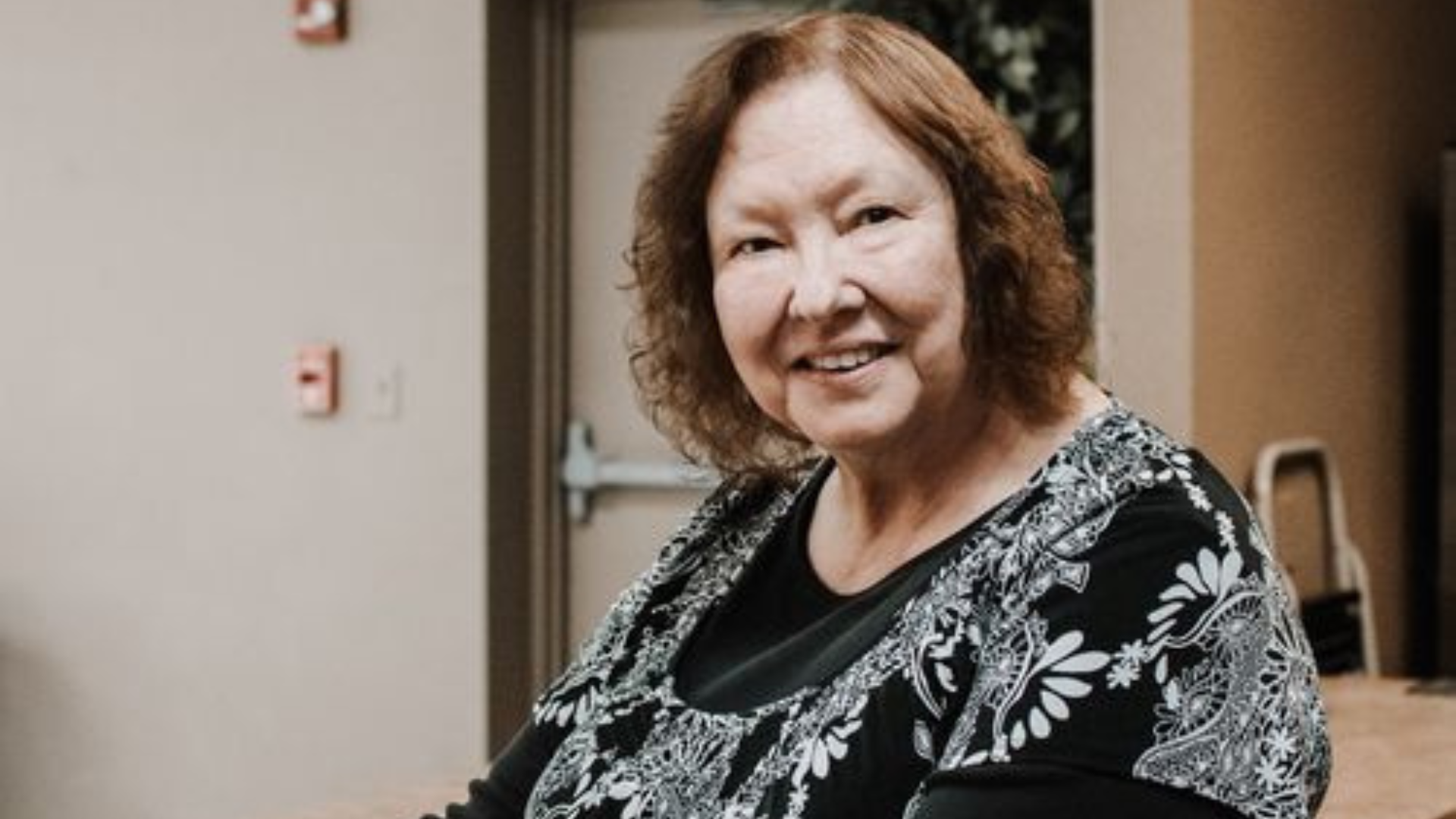 portrait photography of man wearing black suit jacket