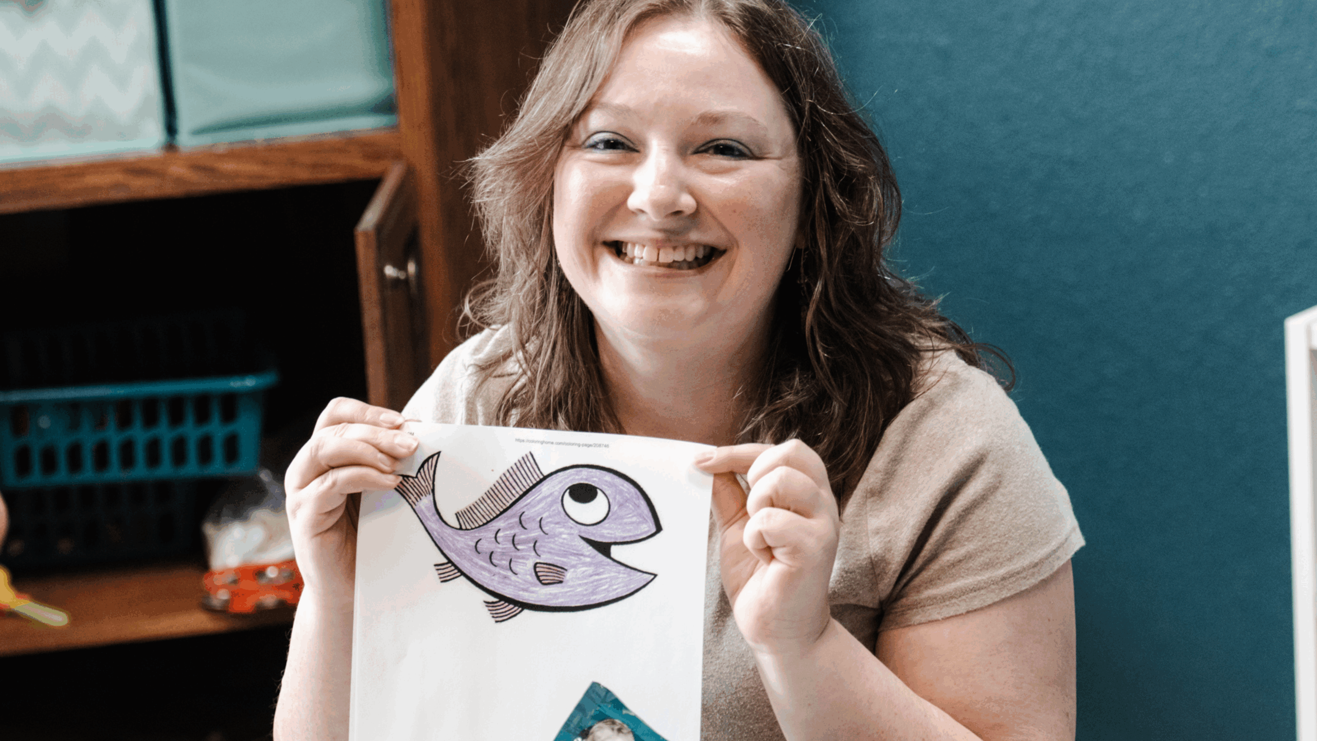 5 babys feet on white textile