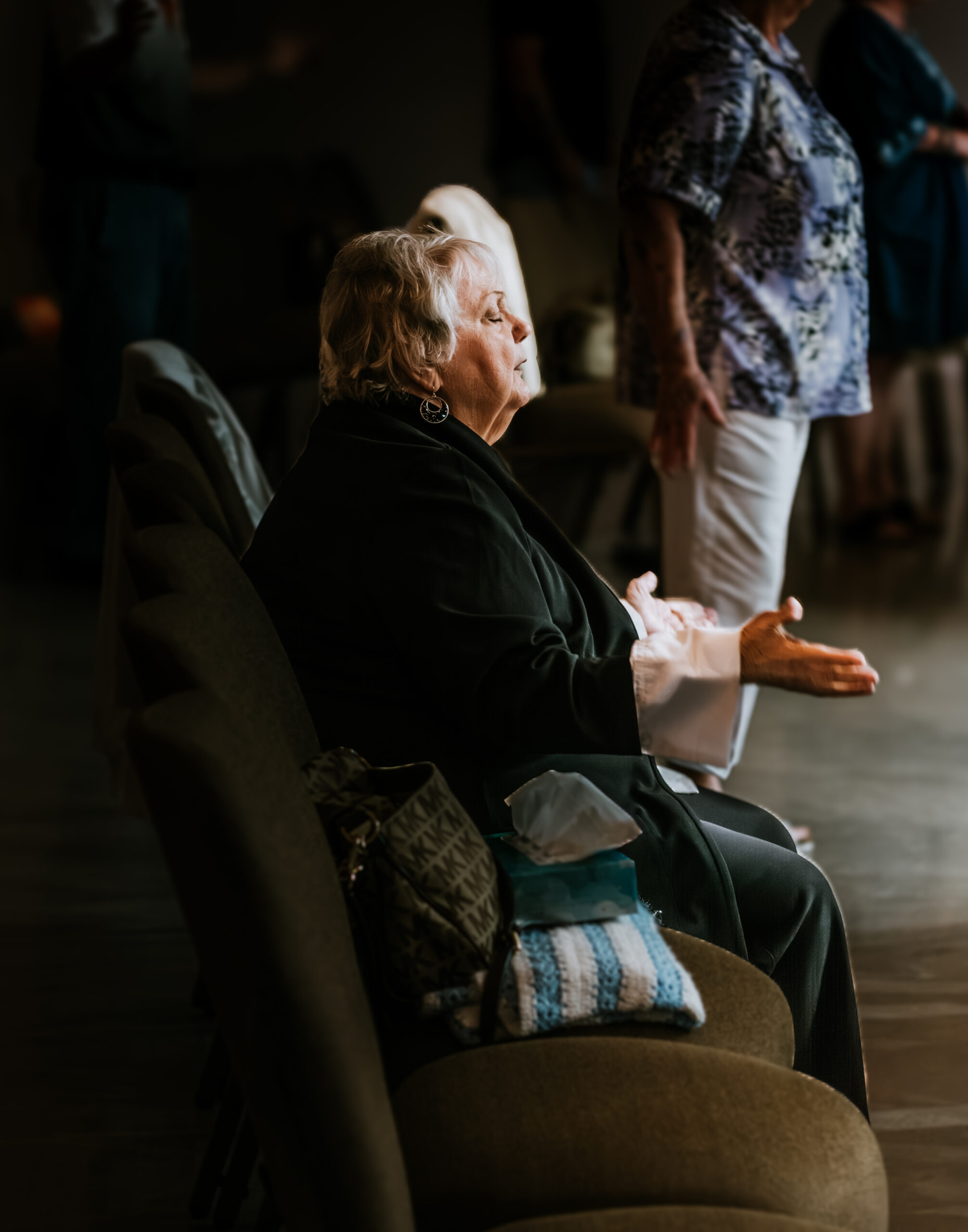 DSC_2862 people sitting on chair in front of table while holding pens during daytime
