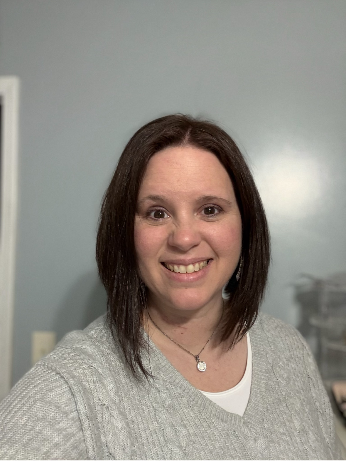 IMG_0265 a man standing on top of a pile of snow